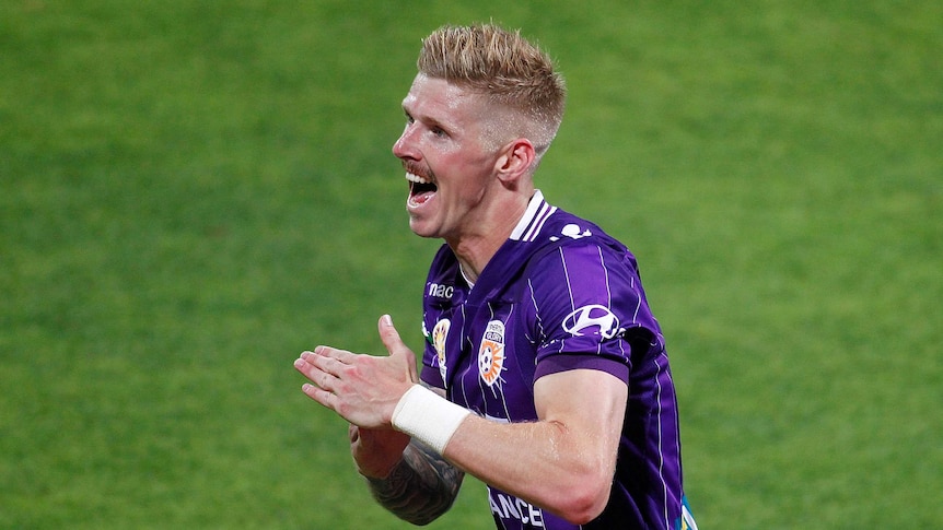 Andy Keogh celebrates scoring Perth's second against Wellington