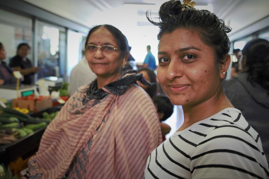 Darwin woman Divya Dobariya and her mother-in-law Mukta Patel at the Rapid Creek markets, May 2020.