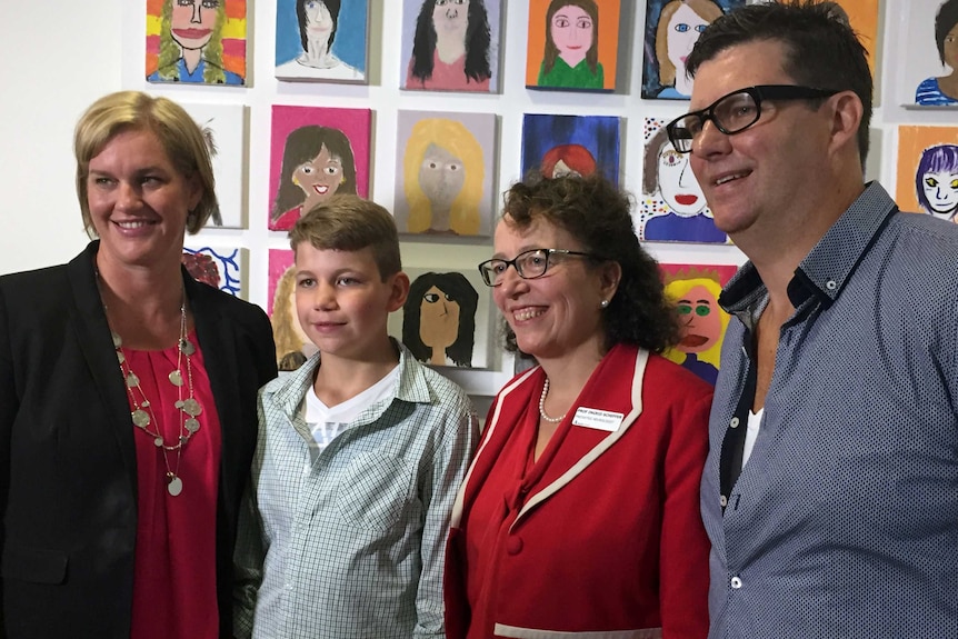 Nicholas Johnson, with mother D'Lene (far left) and father Glenn (far right) and Ingrid Scheffer (centre right).