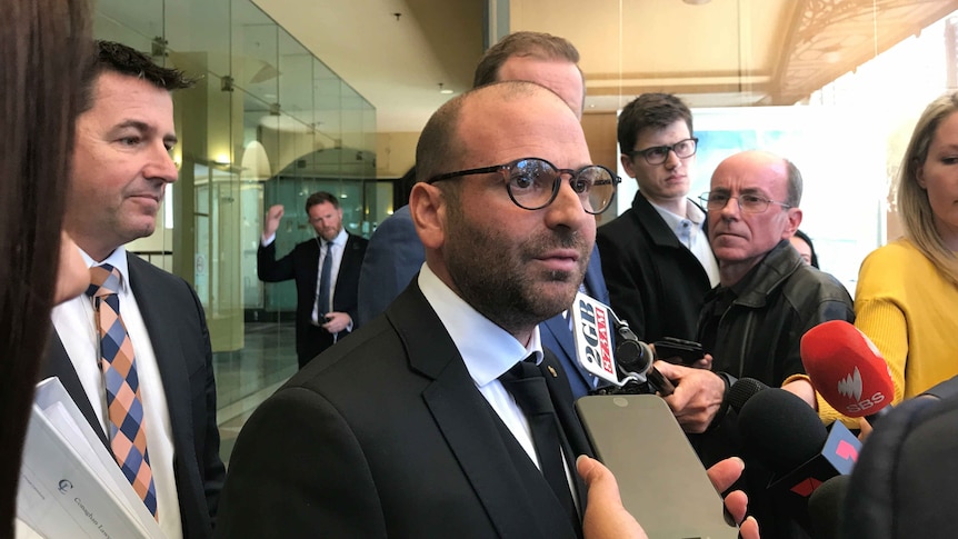 George Calombaris outside court.