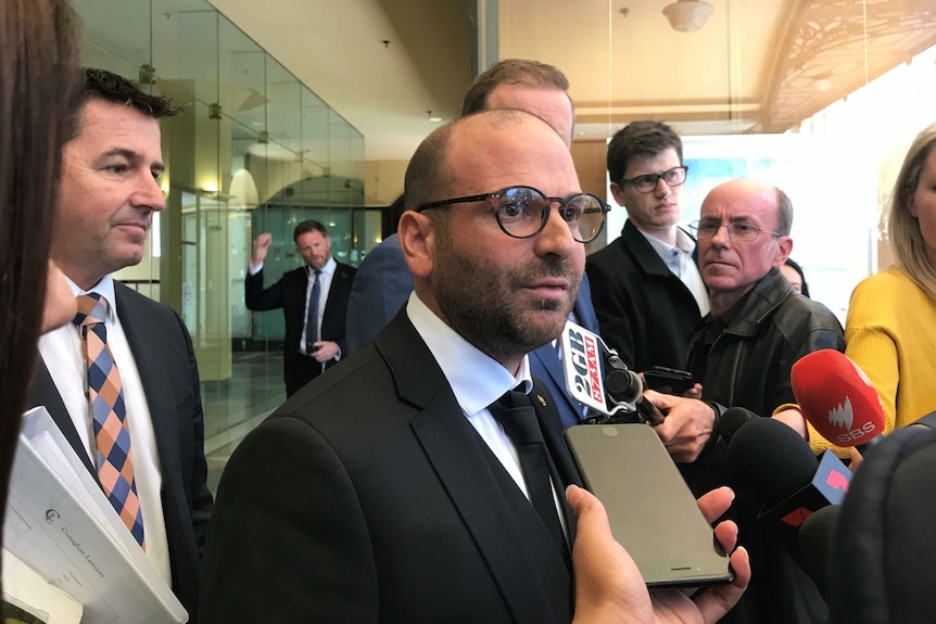 George Calombaris outside court.