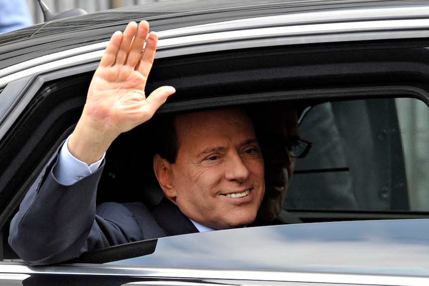 Berlusconi leaves Justice Palace