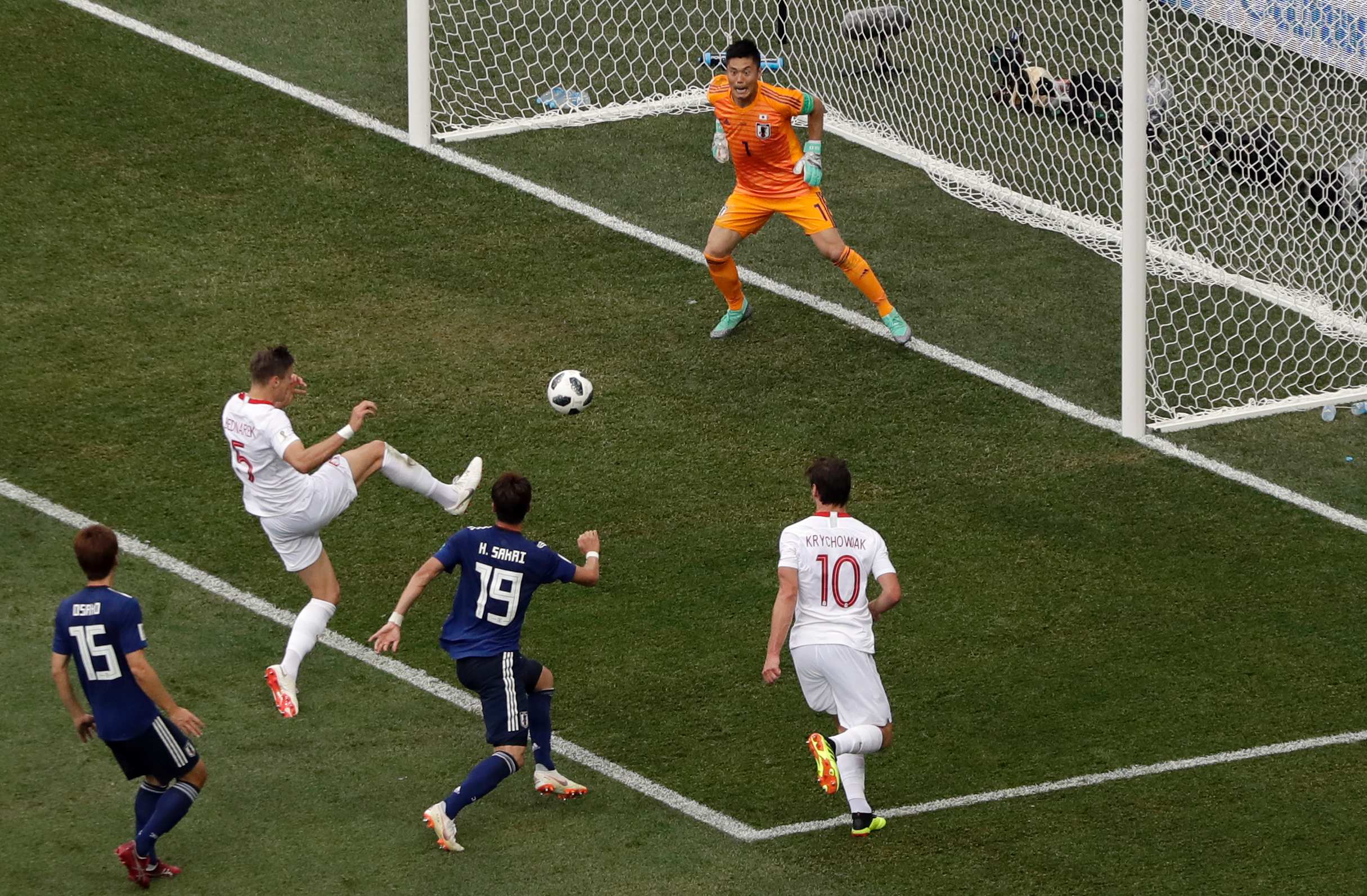 World Cup Poland Beats Japan But Blue Samurai Still Progress Thanks To Disciplinary Record Abc News