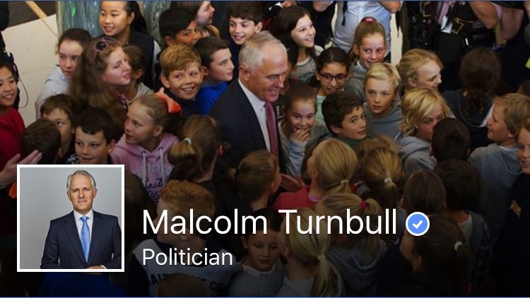 Prime Minister Malcolm Turnbull surrounded by children.