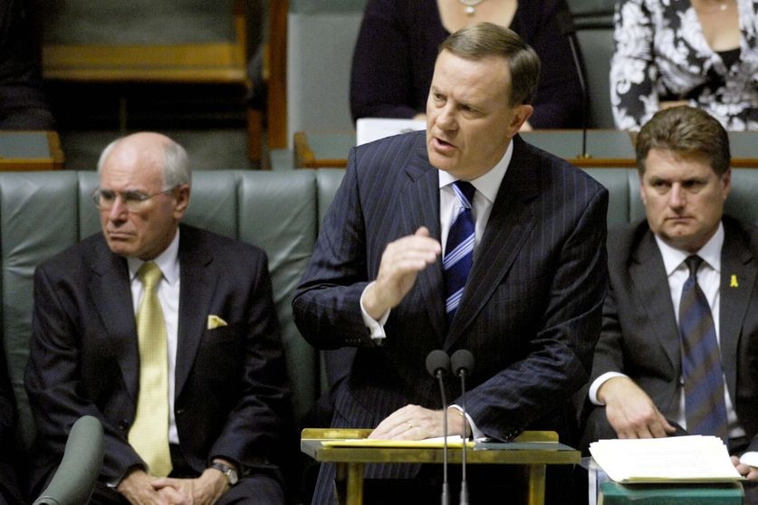 John Howard listens as Peter Costello delivers his 12th and final Federal Budget