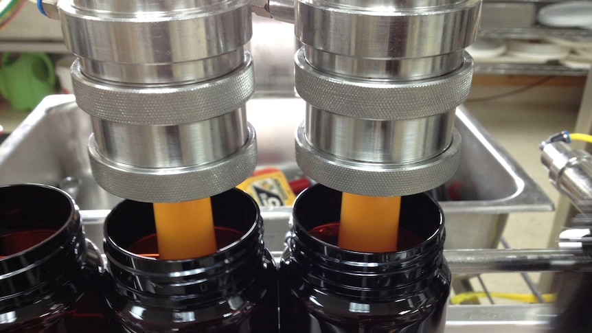 Processing plant fills bottles with Manuka Honey