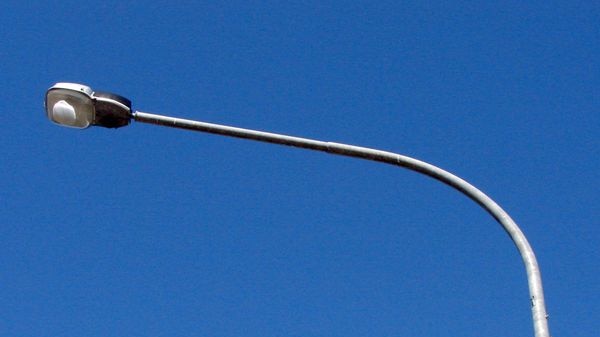 Generic street light with blue sky background