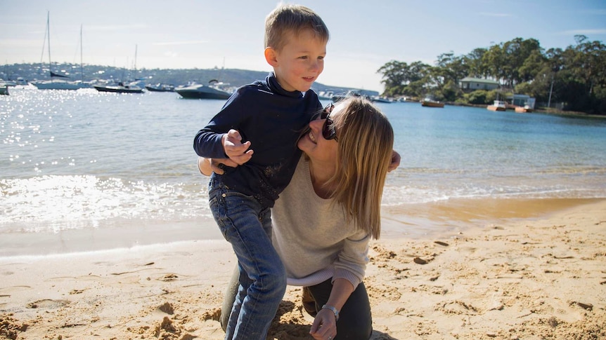 Kate Beattie with her son Tom Strahan on a visit to Sydney