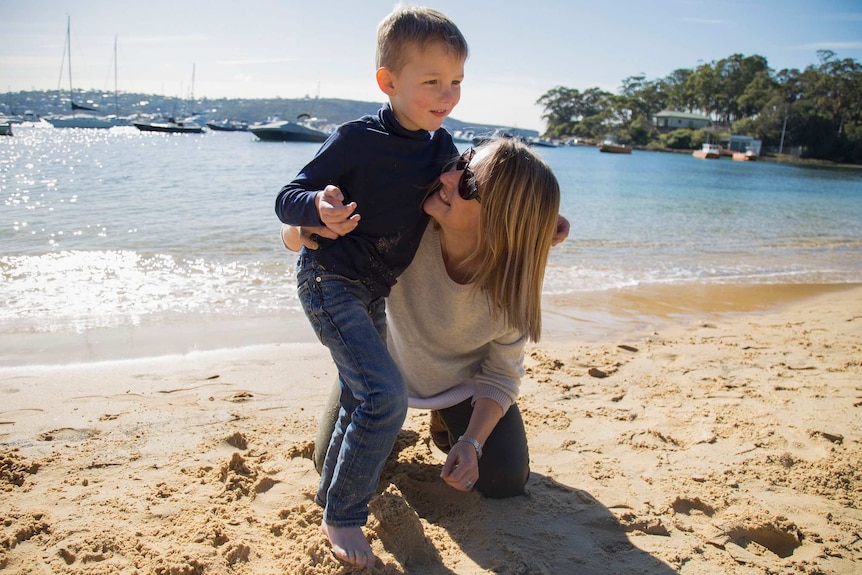 Kate Beattie with her son Tom Strahan on a visit to Sydney