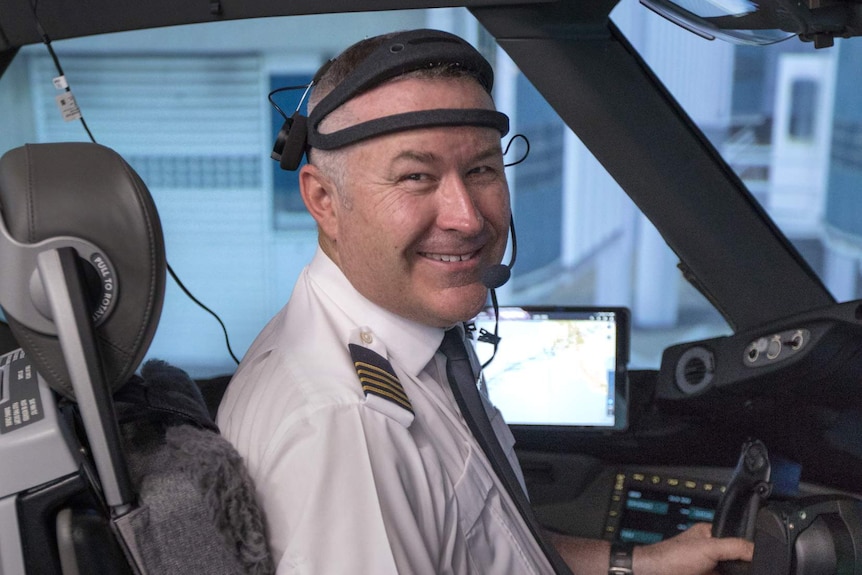 Qantas Captain Sean Golding inside the cock pit.