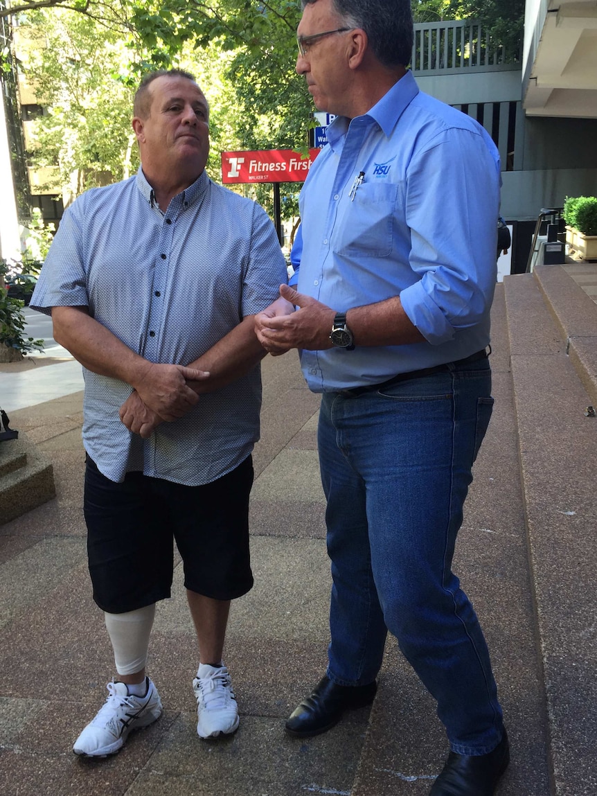 Security guard Barry Jennings (left) with Gerard Hayes