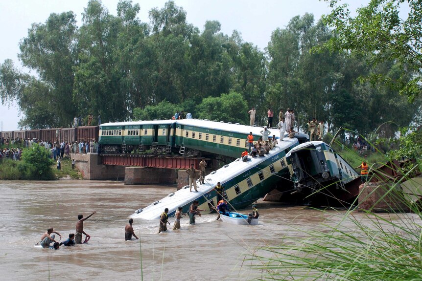 Train plunges into canal