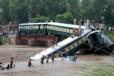 Train plunges into canal