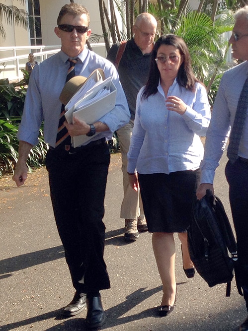 Alexandra Xana Kamitsis with her legal team outside the NT Supreme Court.