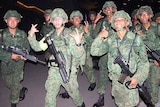 Singapore soldiers completing a marathon at the Basic Military Training Centre