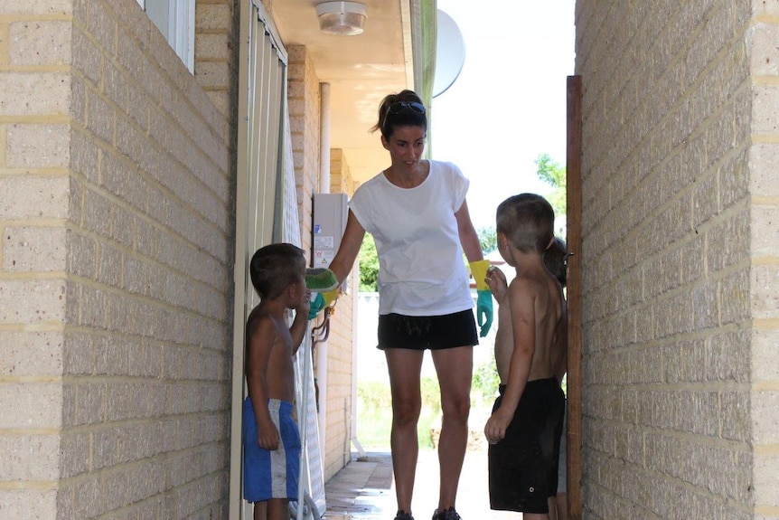 A volunteer with kids