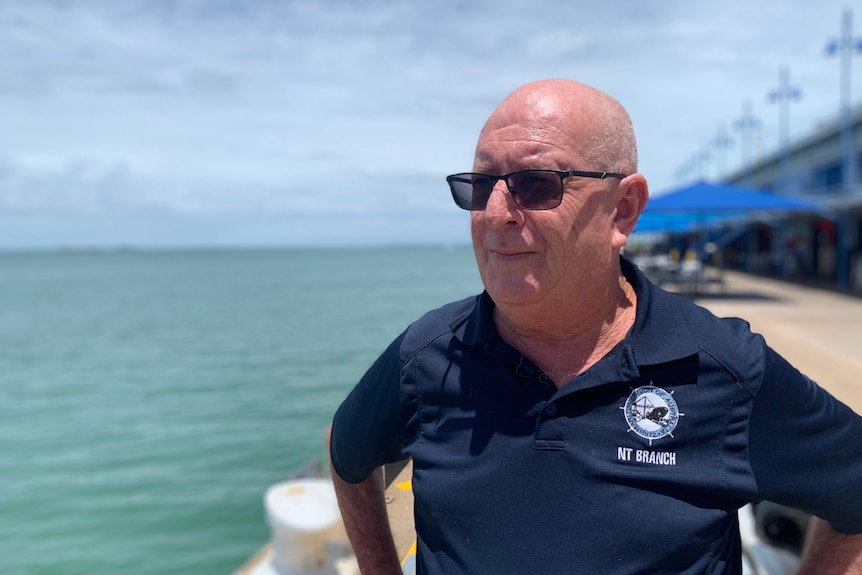 NT Maritime Union branch secretary Andy Burford said looks across the water at a wharf in Darwin.