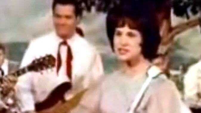 Kitty Wells performs It Wasn't God Who Made Honky Tonk Angels.