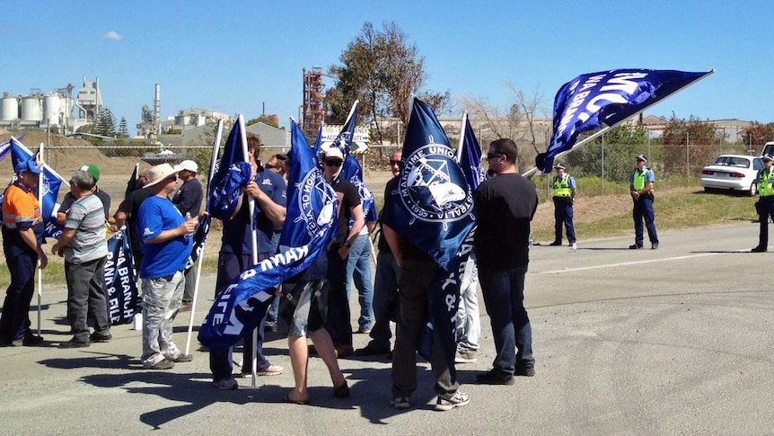 Police watch on as Maritime Union members protest