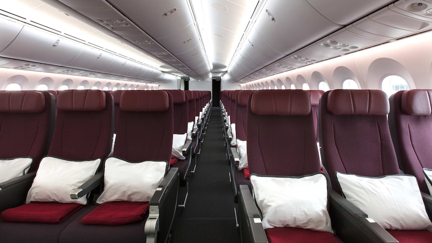 Lines on maroon-coloured seats on Qantas's Dreamliner 787-9.