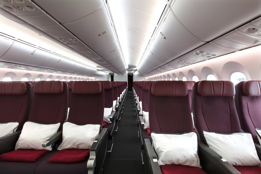 Lines on maroon-coloured seats on Qantas's Dreamliner 787-9.