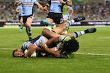 Cronulla's Wade Graham scores a try against the Raiders in Canberra in round 2, 2017.