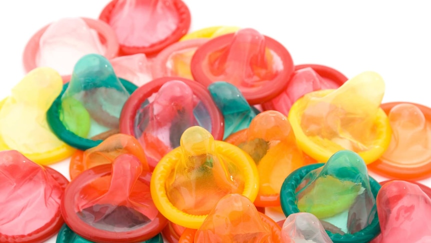 An assortment of multi coloured condoms