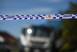 Police tape on a suburban Adelaide street.