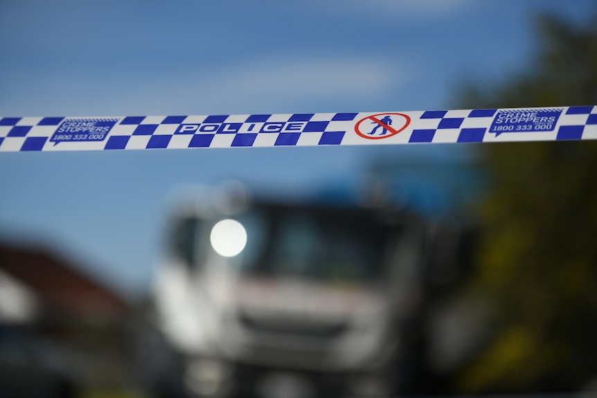 Police tape on a suburban Adelaide street.