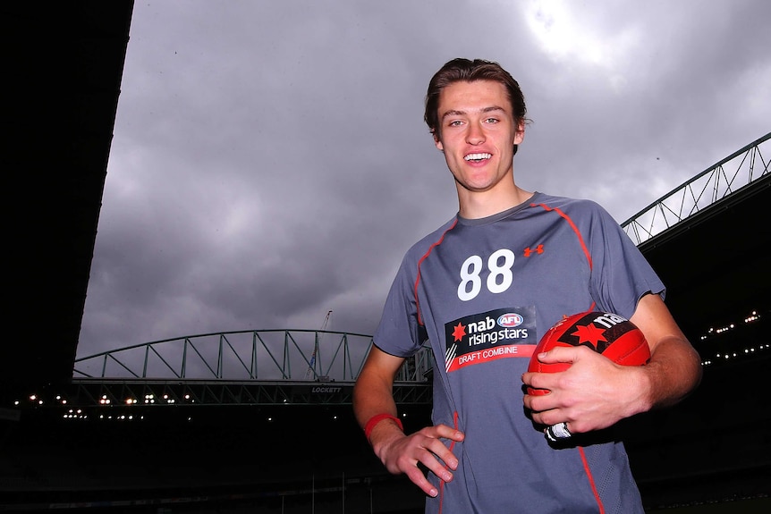 Oakley Chargers' Darcy Moore poses during the 2014 AFL Draft Combine at Docklands in October 2014.