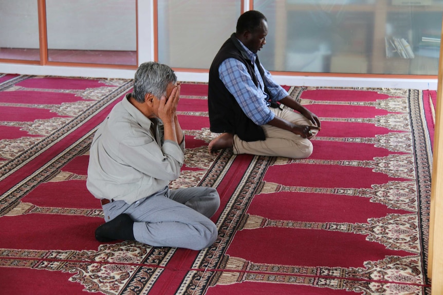 Hobart Imam Sabri Samson prays