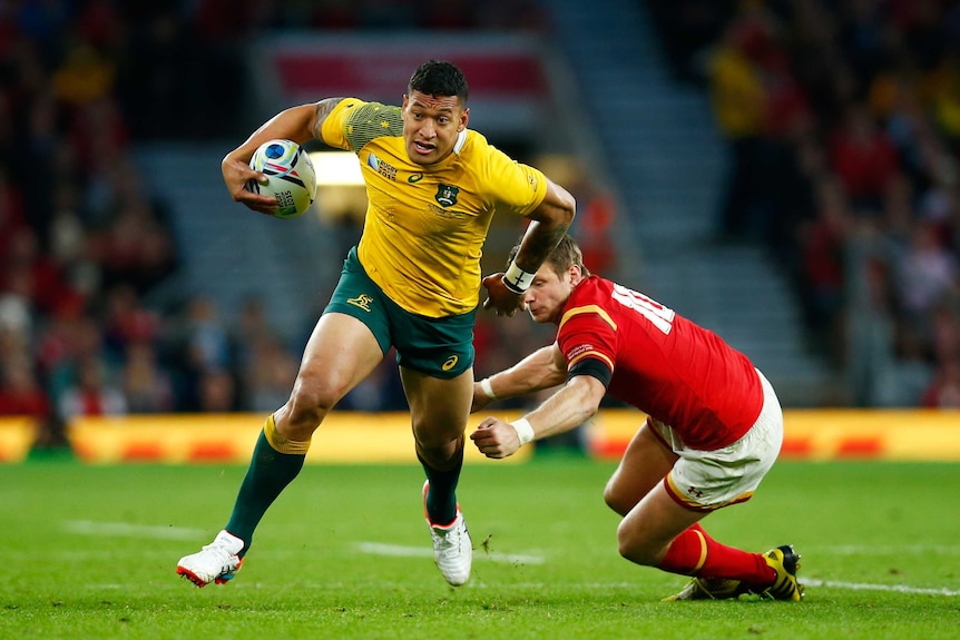 Injury troubles ... Israel Folau attemps to evade a tackle by Dan Biggar