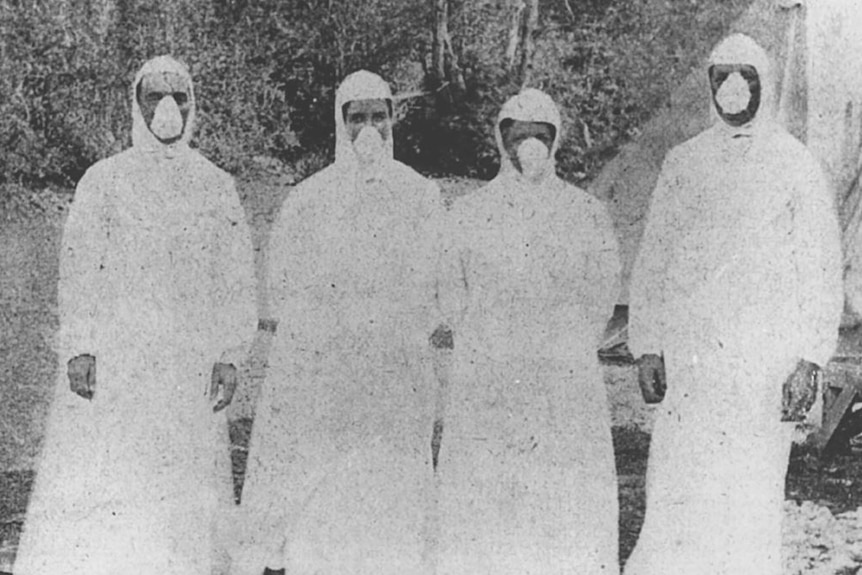 People wearing masks in Tasmania during the Spanish flu outbreak.