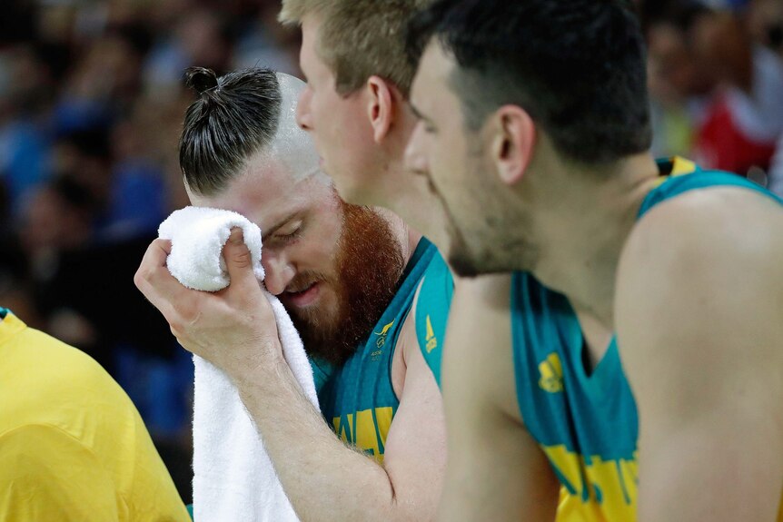Aron Baynes reacts on the bench during Australia's semi-final match against Serbia