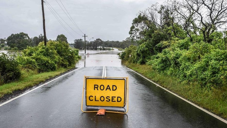 A road closure sign at an inundated road in north west NSW 