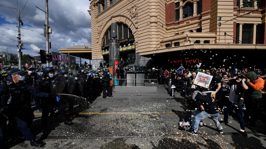 More than 200 anti-lockdown protesters arrested, six police officers hospitalised after violent Melbourne demonstration