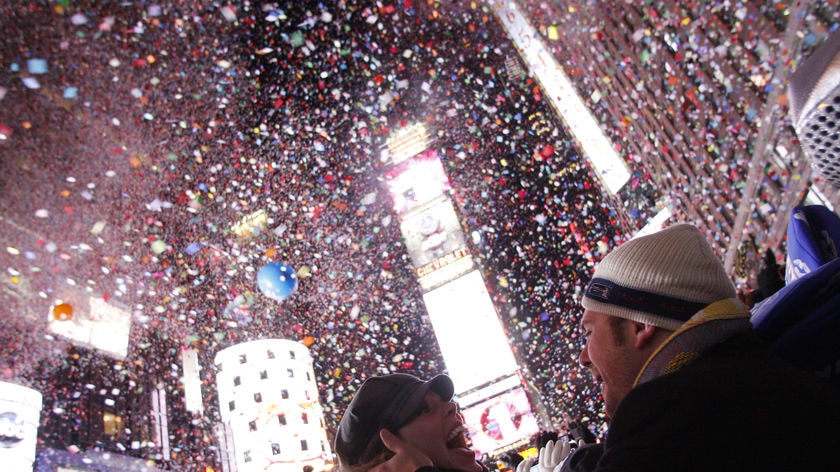 A couple celebrates New Year at Times Square in New York