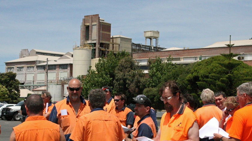 Workers outside Tas Paper's Burnie mill.