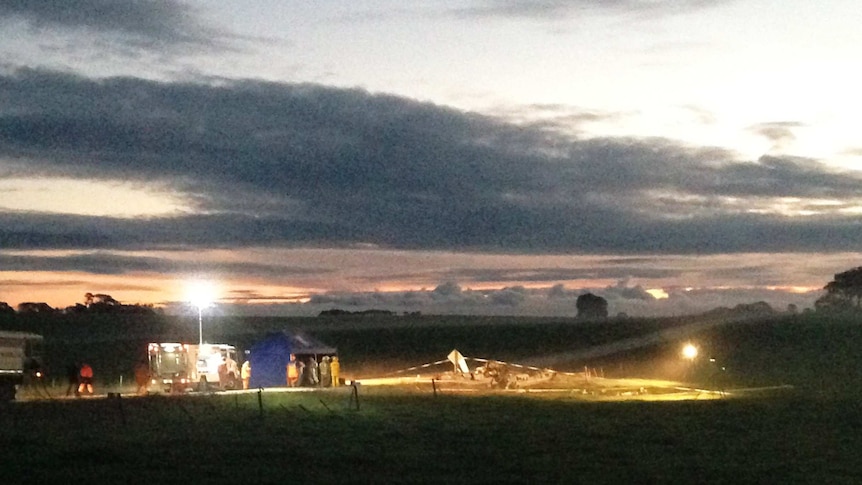 Lights at the scene of a light plane crash near Mount Gambier, after sunset.