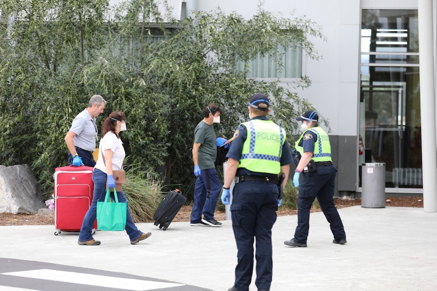 People arriving in Tasmania enter quarantine at a Hobart hotel