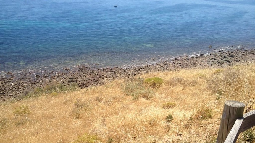 Man in only boxer shorts was found at the base of the cliff