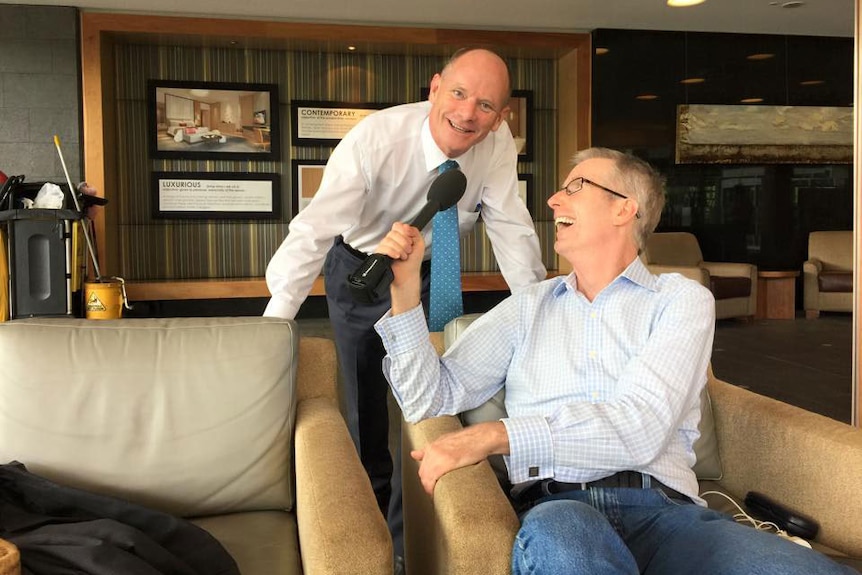 Qld Premier Campbell Newman with state political reporter Chris O'Brien on the campaign trail on January 9, 2015