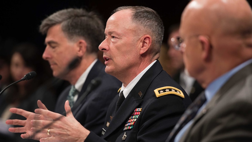 Director of the NSA Keith Alexander and intelligence chiefs James Clapper (R) and Chris Inglis (L)