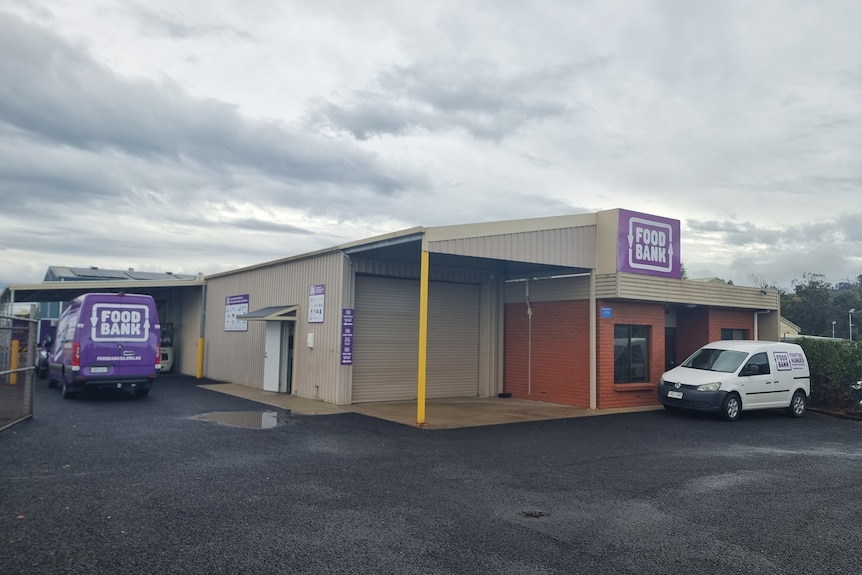 A building with purple signage saying FOOD BANK