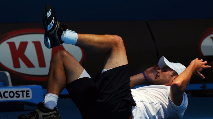 Roddick was not overly impressed after taking a tumble over the line's judge.