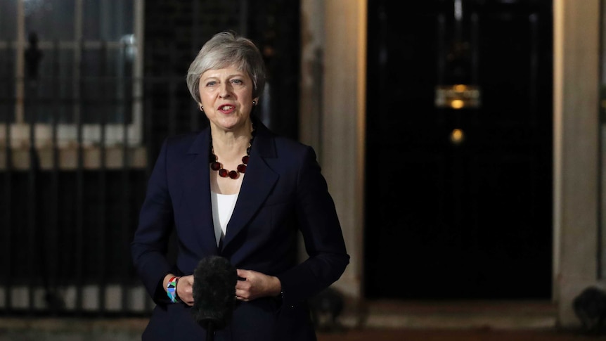 Theresa May talks to media outside 10 Downing Street