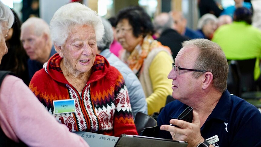 89 year old Edna Cable with trainer Martin Yates at the tech savvy seniors seminar in Perth