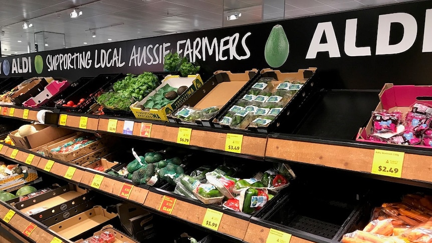 A sign in an ALDI store saying "we support Aussie farmers".