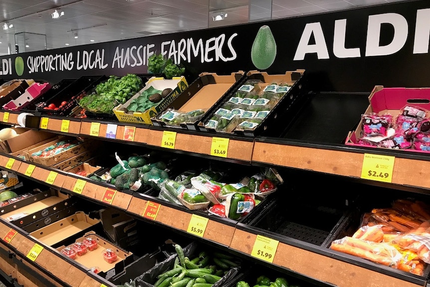 A sign in an ALDI store saying "we support Aussie farmers".