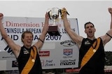 Paul Kennedy celebrates the grand final win with his captain and friend.